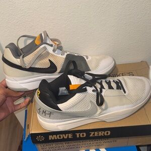 Nike Men's White and Black Sneakers with Orange Accents